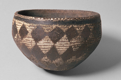 Cup with Geometric Decorations