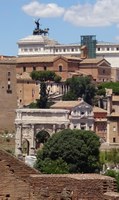 View of the Roman forum juxtaposing ancient and modern buildings.