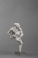 Plaster sculpture of a dynamic, muscular figure in a twisting pose on a metal base, against a plain gray background.