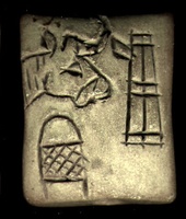 Clay tablet with carved depiction of an ox head and several architectural elements