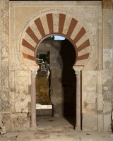 Elaborate doorway flanked by two columns.