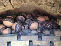 an image of tan small pottery bowls