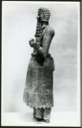 12. Study photograph of a standing male figure (OIM: A12434)