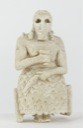 47. Seated Male Figure Holding a Cup