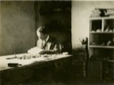 78. Leon Legrain working in the “Tablet Room” of the Expedition House, Ur