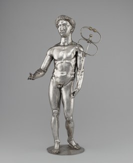 A silver statuette of Mercury, holding caduceus.