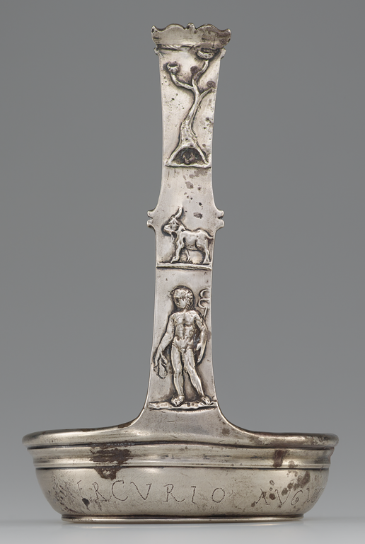 Photograph of a silver ladle with handle decorated with Mercury holding the caduceus, a goat, and a tree