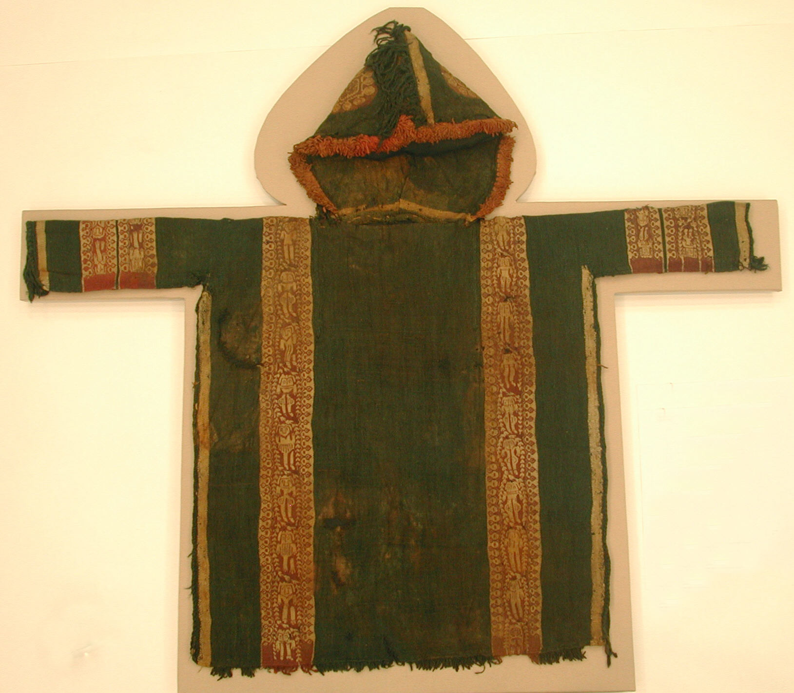 CHILD’S TUNIC WITH HOOD