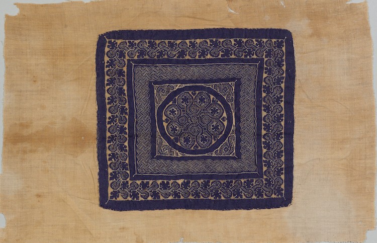 FRAGMENT OF A FURNISHING (?) WITH VEGETAL MOTIFS AND GEOMETRIC INTERLACE