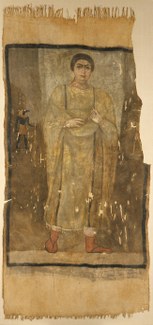 SHROUD OF A WOMAN WEARING A FRINGED TUNIC