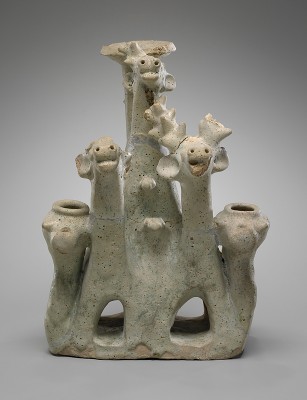 Green-Glazed Terracotta, H. 31.8 cm, W. 23.3 cm, D. 13.9 cm. From the Cistern at the Temple of Atargatis, Dura-Europos, mid-2nd–mid-3rd century CE. Yale University Art Gallery, Yale-French Excavations at Dura-Europos: 1938.4966. 
