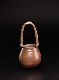 Basket Shaped Jar with Looped Handle and Decorative Grooves