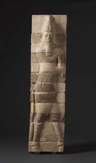 Bricks with a protective bull-man and cuneiform inscription
