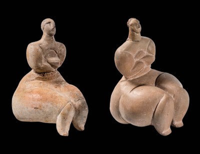Two Seated Figures with Crossed Arms