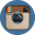 Instagram icon: a stylized, rectangular camera on a blue, circular background