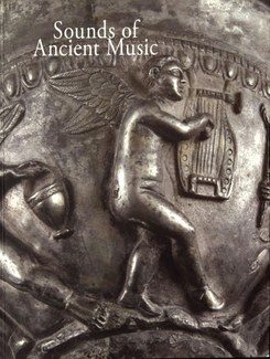 Cover of the book "Sounds of ancient music = צלילי מוזיקה עתיקה," showing a metal relief of a figure playing a harp.
