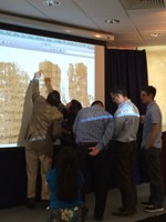 Papyrologists in Action: (from left to right) Roger Bagnall and Micaela Langellotti (UC Berkeley) discuss a reading in a Roman-era contract presented by Micaela, while Todd Hickey (UC Berkeley), David Ratzan, and Graham Claytor (Basel) debate alternative reconstructions of the document's opening formula.