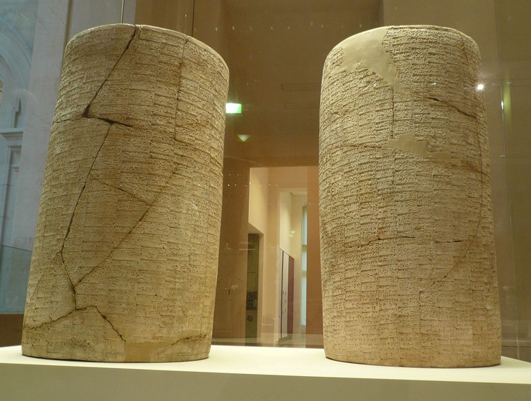 The Cylinders of Gudea, the longest continuous Sumerian text, at the Louvre Museum (photo by Ramessos via wikimedia)