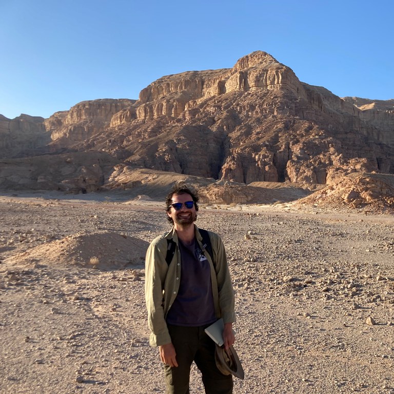 Braden Cordivari pictured in front of the ancient copper mines of Timna during his time abroad 