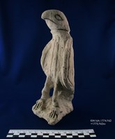 Photograph of stone sculpture of hawk described in news item text.