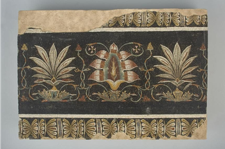 Small roman mosaic depicting lotus flowers and palmettes in stone and glass decorations