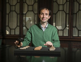 Dr Martin Worthington, who provided Babylonian translations for Marvel Studios’ ‘Eternals’ is pictured in the Library of Trinity College Dublin reading a Sumerian cuneiform tablet, which uses the same wedge-shaped script as Babylonian.  Copyright: Trinity