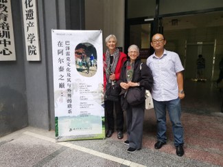 Katheryn Linduff, Karen Rubinson, and Jian Ma, with poster announcing the seminar.   Photo by Duo Tian.