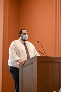 David Danzig speaking at the lectern in ISAW lecture hall