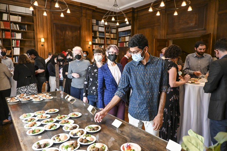 ISAW community lining up for food at commencement reception