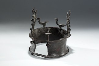 Image of elaborate copper crown (see further caption)