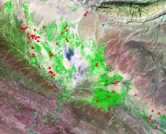 Archaeological sites across the plain and foothill of Deh Luran landscape.  Base map: Landsat Thematic Mapper, courtesy of the US. Geological Survey. 