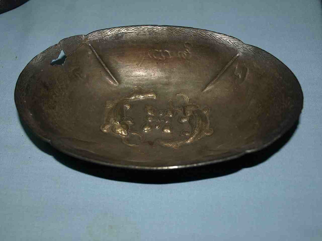 Photograph of the inside of the dish bearing inscription . Taken by William Southworth on .