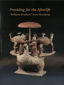 A book cover features the book's title overlaid on an image of an elaborate ceramic object with a base like a stylized bird with flat back and outstretched wings on top of which two human figures hold an umbrella between them. There are also two smaller human figures and two objects that look like covered pots with wings.