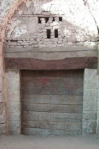 Fig.2 The house of Abu Nafir in al-Qasr. Note the reuse of stone and the carved lintel.