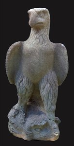 photograph of a stone eagle figure